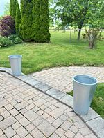 Both galvanized planters on patio