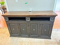 front view showing full sideboard with doors and cubbies