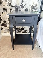 Front view of painted MDF side table showing drawer and shelf