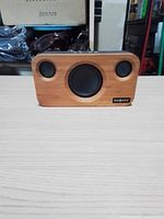 Front view showing bamboo panel and driver layout