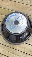 Top view of Eminence Kappa 15-inch woofer showing label and cone back plate