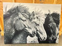 Full view of the canvas print showing three horses