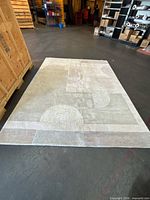 Full view of LH Imports wool rug laid flat