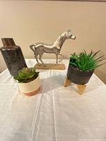 All four decor items grouped on table