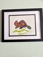 Full view of framed artwork