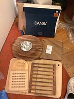 All boards, stainless bowl and Dansk box displayed
