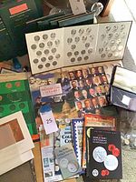 Overview of albums, booklets, loose coins and coin holder