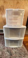 Stacked plastic drawer units showing three-drawer upper and two-drawer lower sections
