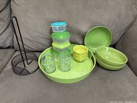 All items grouped: serving tray, bowls, condiment bowls, storage containers, tumblers, caddy