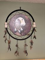 Full view of dreamcatcher against wall