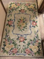Full view of rug showing overall design and condition
