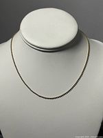 Full view of necklace on display bust