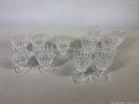 Group of 11 Waterford Colleen footed glasses, two heights