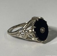 Side view of ring showing filigree work and onyx tablet
