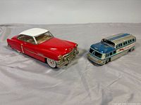Overview of Cadillac car and Greyhound bus