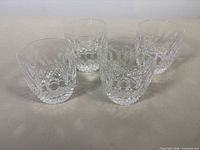 Four Waterford Colleen old-fashioned glasses grouped