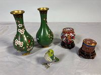 All five cloisonné pieces grouped together