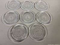 Eight Waterford crystal dessert plates arranged face up