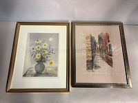 Both framed artworks side by side