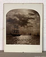 Full view of framed photograph showing image, mat and frame