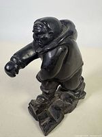 Front angled view of Inuit soapstone carving