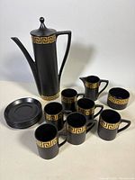 Full set: coffee pot, creamer, sugar, six cups, six saucers