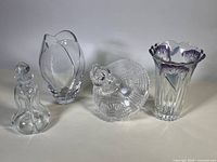 Group shot of all four glass and crystal pieces