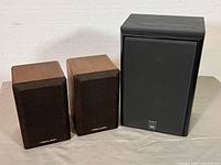 Front view showing two Realistic Minimus-7W speakers and one JBL 2500 speaker