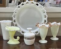 Group shot showing all six milk glass items