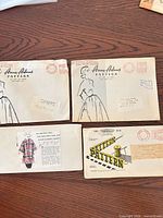 front view of four envelopes laid out