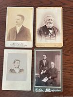 Group shot of all four cabinet cards on table