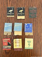 Front view of all nine matchbooks