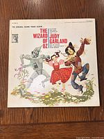 Front cover showing album title, Judy Garland credit and characters illustration