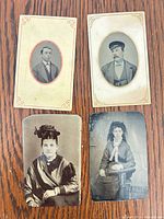 Group shot of all four photographs on wood surface