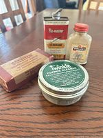 Group shot of all four vintage containers