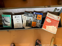 Pattern booklets laid out in case