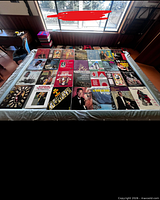 Overhead view of approximately 30 vintage LPs laid out, showing various big band, country and easy-listening titles