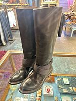 Full view of both boots standing upright