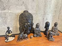 Group shot showing all figurines on wooden surface