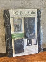 Front view of sealed Office Folio set showing portfolio and accessories