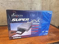 Front of sealed Imation SuperDisk LS-120 drive box