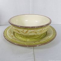 Bowl stacked on plate showing overall design and size relation