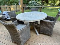 full patio set showing table and four chairs