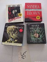 Front view of all four audiobook CD cases