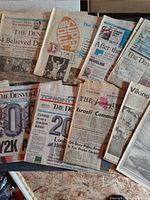 Assorted newspapers spread showing Y2K, Super Bowl, Denver Post issues