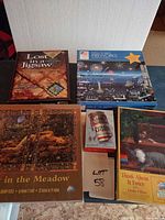 All five boxed puzzles grouped