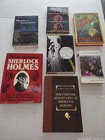 Front view showing all seven book covers