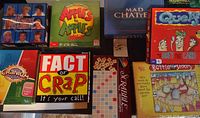 Overhead view of eight boxed games