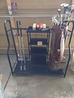 Full view of golf rack with bag, clubs and accessories