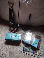Overall lot: rods, reels, net, tackle boxes, wire basket